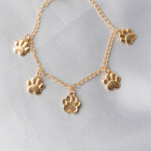 Pulseira infantil de patinhas