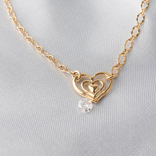 Tornozeleira com coração e pingente zirconia